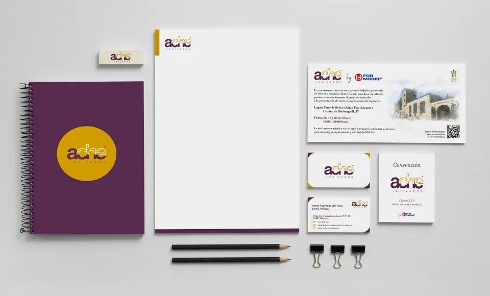 Ache corporate stationery set: notebook, letterhead, envelope, business cards and pencils in purple and mustard