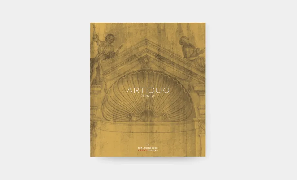 Portada dorada del catálogo Artiduo de Emedos con motivo arquitectónico