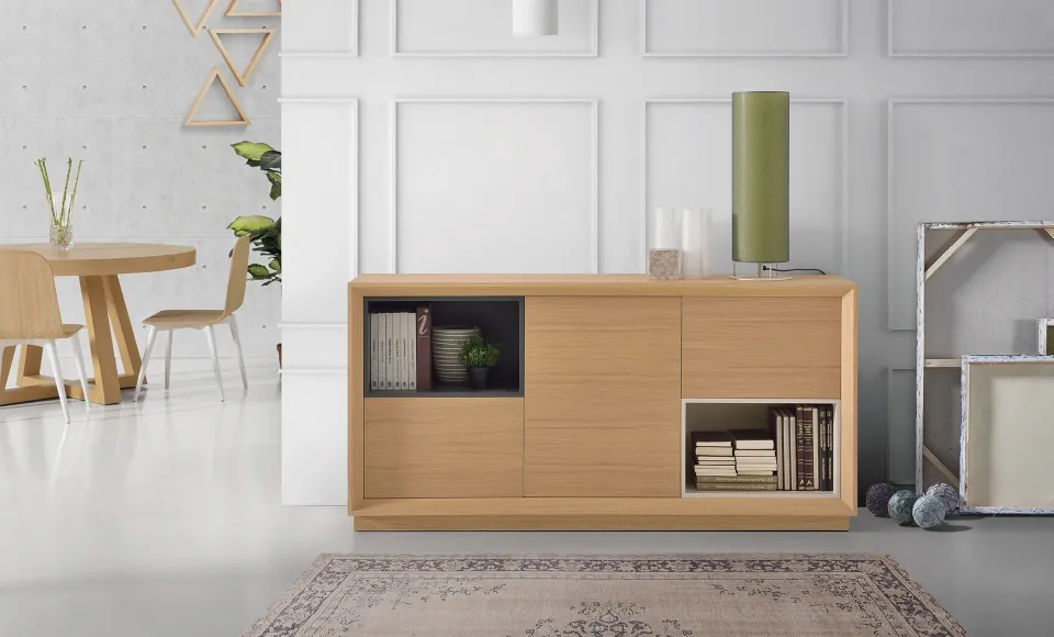 Novas wood sideboard with a dark recess next to a dining area