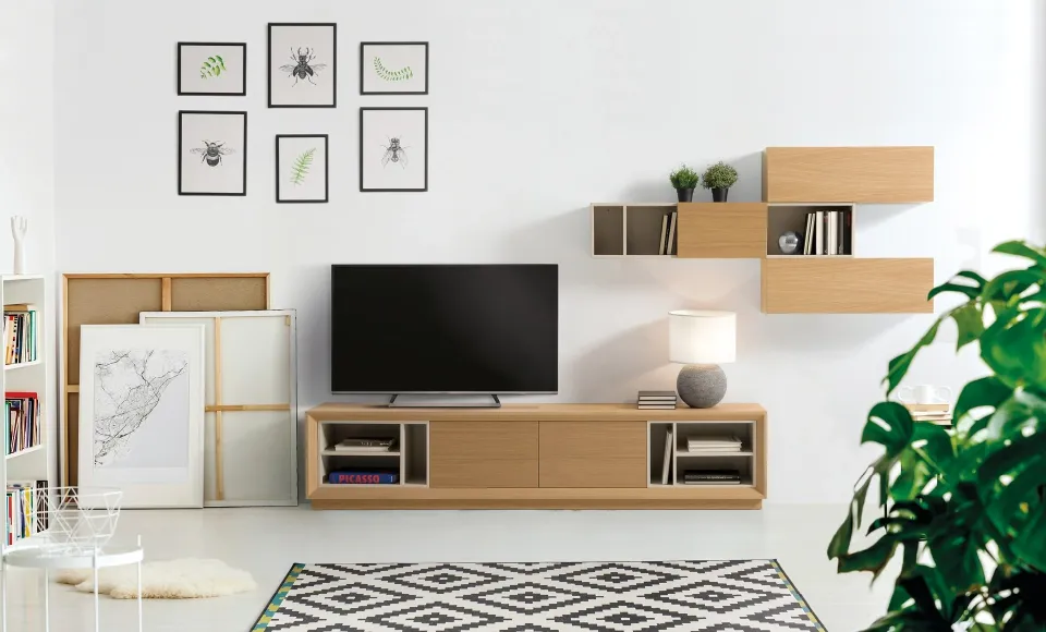 Novas oak living-room unit with shelving and insect prints on the wall