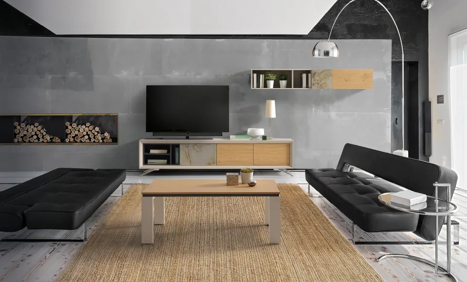 Novas living room with a TV unit, black sofas and a jute rug