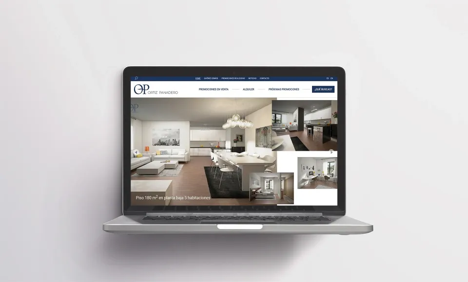 Web inmobiliaria de Ortiz Panadero en un portátil con fotos de una vivienda en venta