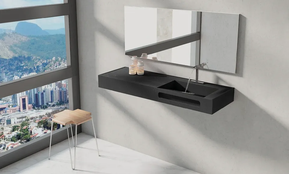 Black wall-hung washbasin with a mirror, in a bathroom overlooking the city