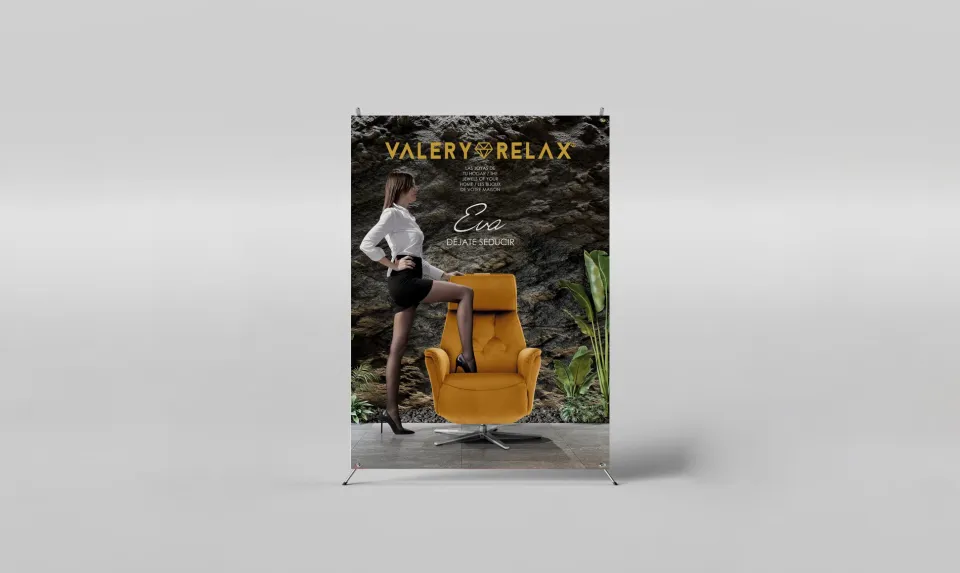 Valery Relax roll-up banner featuring the mustard-yellow 'Eva' recliner armchair