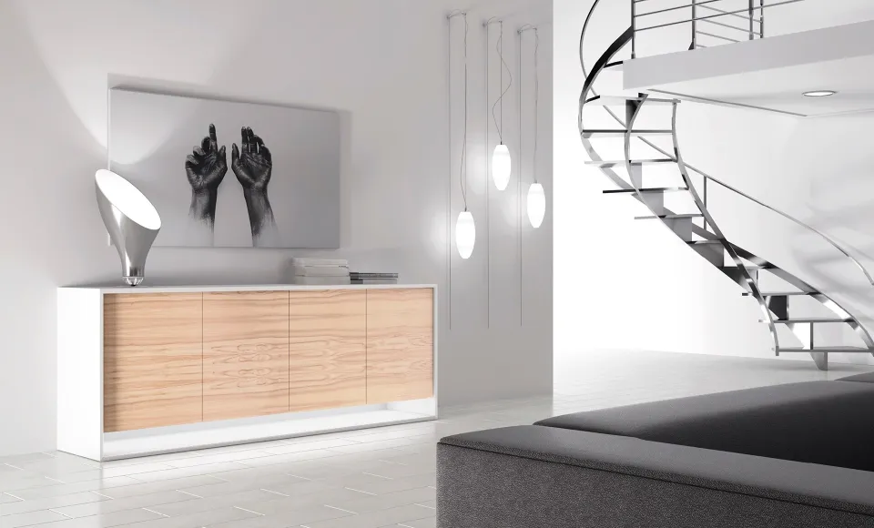Aparador en madera y blanco junto a una escalera de caracol metálica